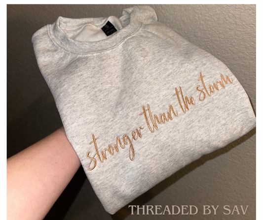 Stronger than the storm Crewneck